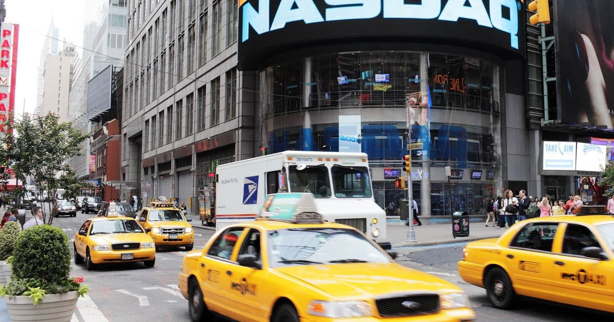 Dow rises in calm premarket trade as retailers and chip stocks jump